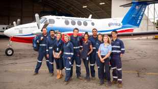 RFDS Season 3 cast members with plane.